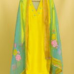 Bold Yellow Base Paired with a Dreamy Pastel Green Dupatta